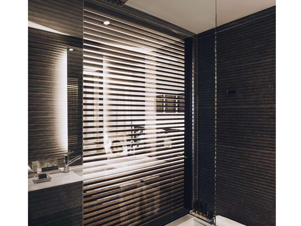 Sls Buenos Aires Puerto Madero Hotel Стая снимка A shower enclosure with a fixed glass panel